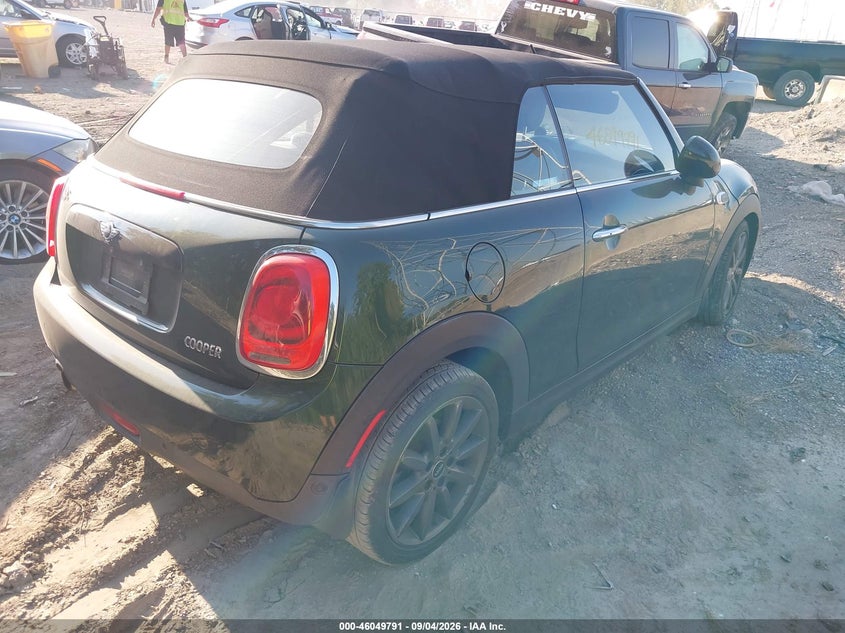 2017 Mini Convertible VIN WMWWG5C32H3C99977 IAAI salvage auction — SIDE, Wait Title, sold $2,050 on 2026-10-03 (photo 4)
