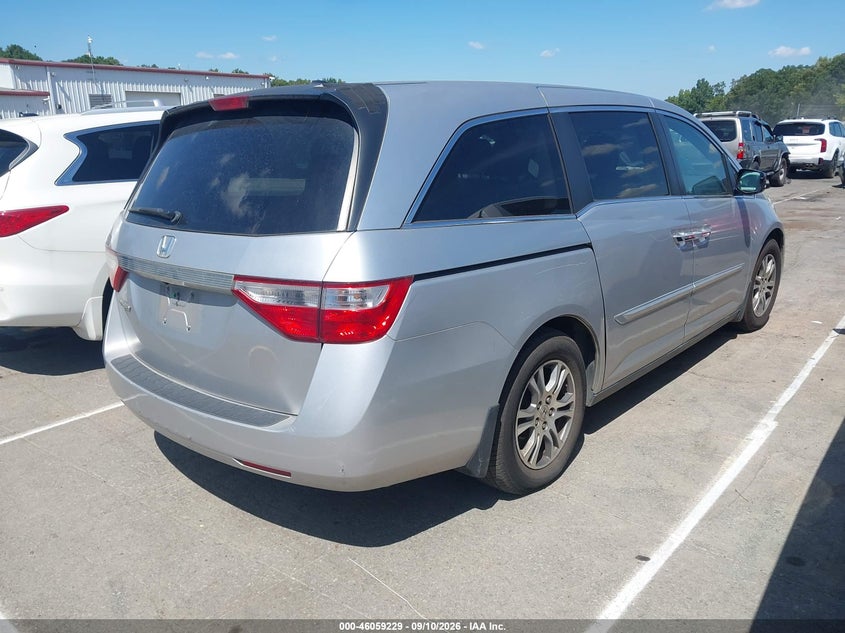 2011 Honda Odyssey VIN 5FNRL5H64BB077091 IAAI salvage auction — Normal Wear & Tear, Clear, sold $800 on 2026-10-12 (photo 4)