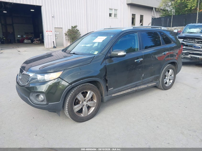 2012 Kia Sorento VIN 5XYKUCA67CG261318 IAAI salvage auction — SIDE, Wait Title, sold $625 on 2026-09-30 (photo 2)
