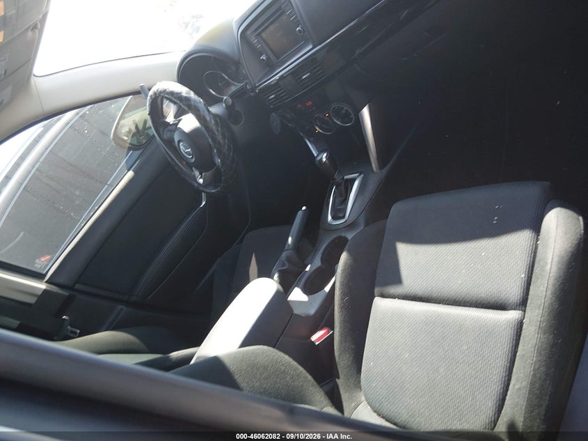 2015 Mazda Cx-5 VIN JM3KE2BE5F0498985 IAAI salvage auction — NORMAL WEAR, Original (Texas), sold $2,550 on 2026-10-05 (photo 5)