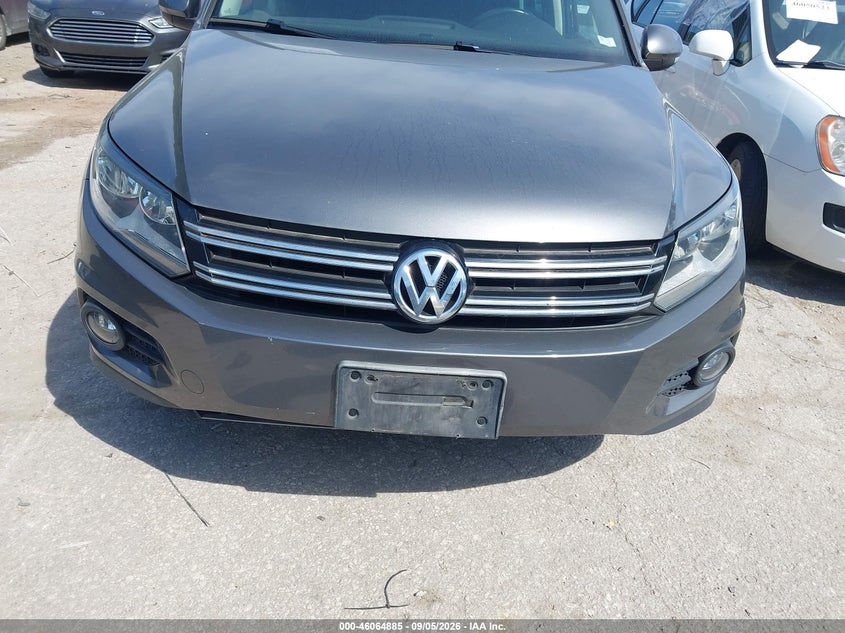 2013 Volkswagen Tiguan VIN WVGAV7AX7DW018391 IAAI salvage auction — NORMAL WEAR, Wait Title, sold $0 on 2026-09-29 (photo 6)