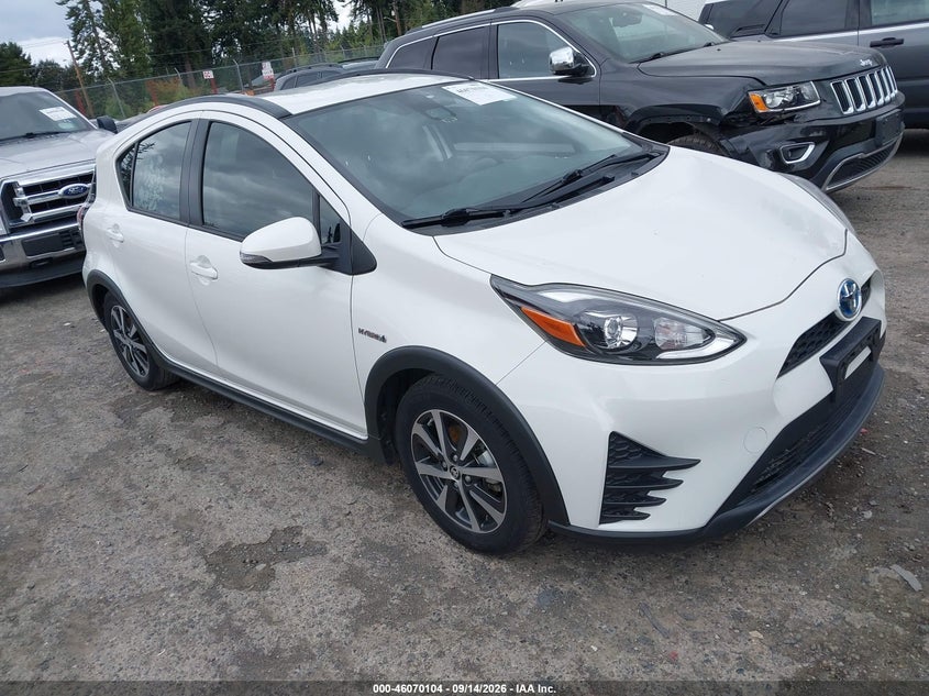 2018 Toyota Prius c VIN JTDKDTB30J1615939 — IAAI salvage auction photo