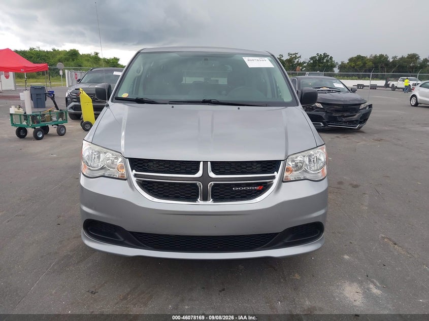 2016 Dodge Caravan VIN 2C4RDGBG2GR350678 IAAI salvage auction — NORMAL WEAR, Clear (Michigan), sold $1,525 on 2026-09-15 (photo 6)