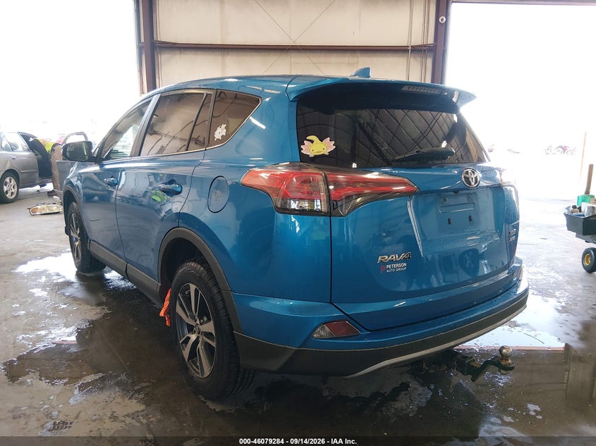 2018 Toyota Rav 4 VIN 2T3RFREV7JW813542 IAAI salvage auction — LEFT FRONT, Salvage Title, sold $9,100 on 2026-10-09 (photo 3)