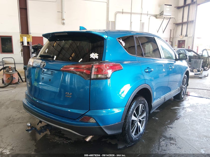 2018 Toyota Rav 4 VIN 2T3RFREV7JW813542 IAAI salvage auction — LEFT FRONT, Salvage Title, sold $9,100 on 2026-10-09 (photo 4)