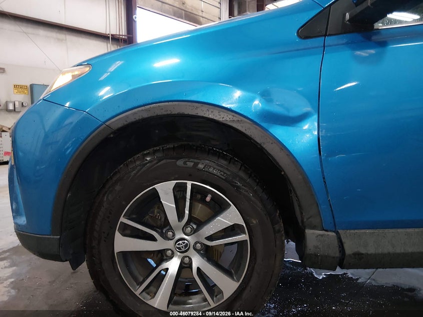 2018 Toyota Rav 4 VIN 2T3RFREV7JW813542 IAAI salvage auction — LEFT FRONT, Salvage Title, sold $9,100 on 2026-10-09 (photo 6)