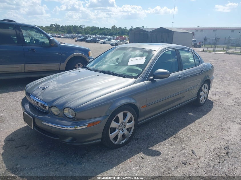 2005 Jaguar X type VIN SAJWA51A85WE59006 IAAI salvage auction — NORMAL WEAR, Clear (Florida), sold $25 on 2026-10-17 (photo 2)