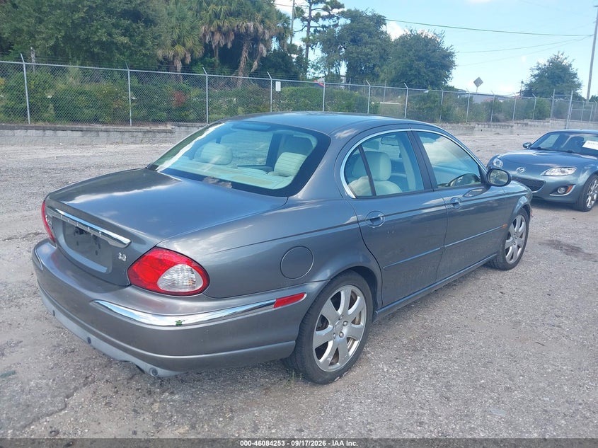 2005 Jaguar X type VIN SAJWA51A85WE59006 IAAI salvage auction — NORMAL WEAR, Clear (Florida), sold $25 on 2026-10-17 (photo 4)