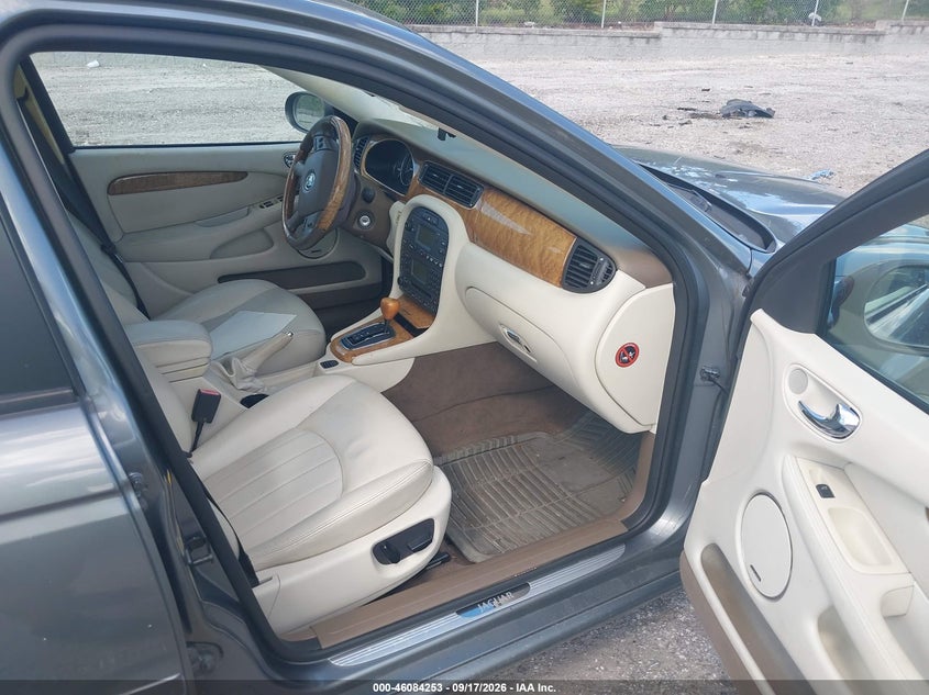 2005 Jaguar X type VIN SAJWA51A85WE59006 IAAI salvage auction — NORMAL WEAR, Clear (Florida), sold $25 on 2026-10-17 (photo 5)