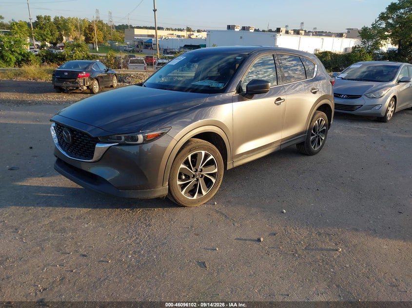 2023 Mazda Cx-5 VIN JM3KFBEMXP0152559 IAAI salvage auction — SIDE, Salvage Title, sold $11,425 on 2026-10-02 (photo 2)