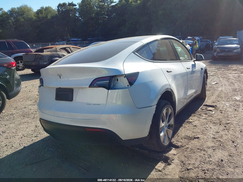 2023 Tesla Model y VIN 7SAYGDEE4PF706185 IAAI salvage auction — LEFT FRONT, Salvage (Massachusetts), sold $12,200 on 2026-10-01 (photo 4)