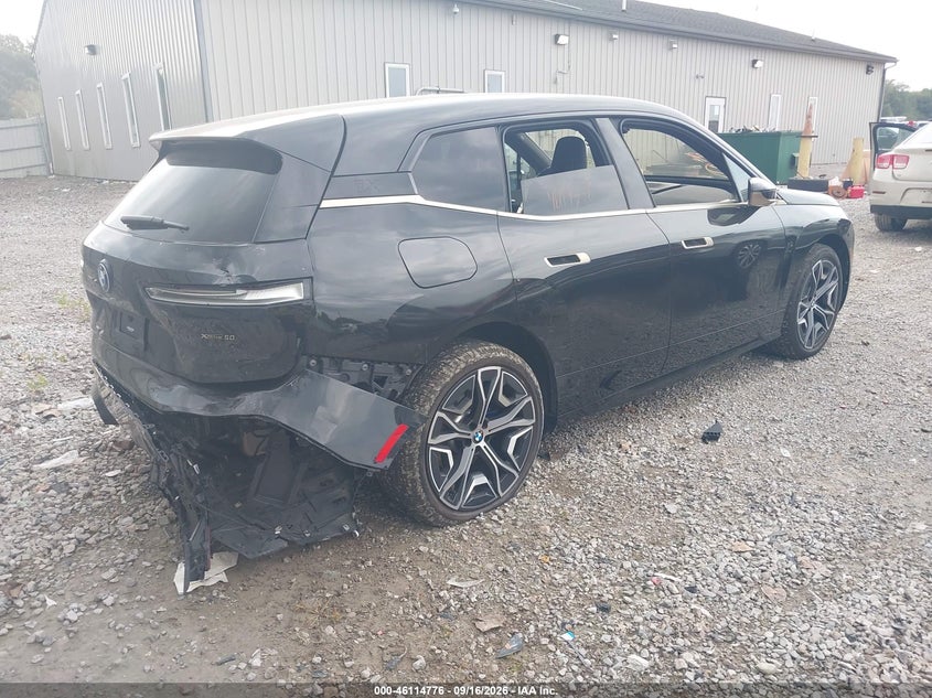 2023 BMW Ix VIN WB523CF07PCM00988 IAAI salvage auction — RIGHT REAR, Wait Title, sold $26,500 on 2026-10-15 (photo 4)