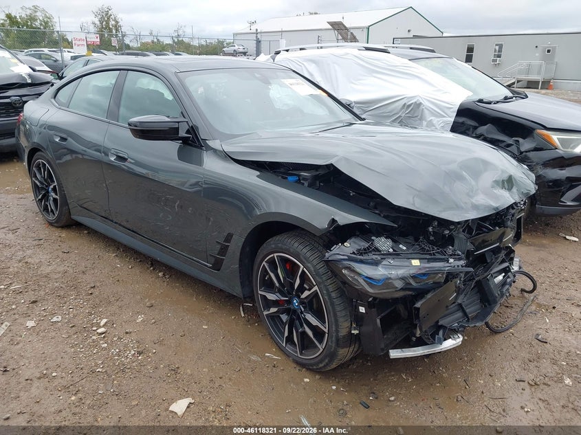 2023 BMW I4 VIN WBY33AW01PFP23749 — IAAI salvage auction photo