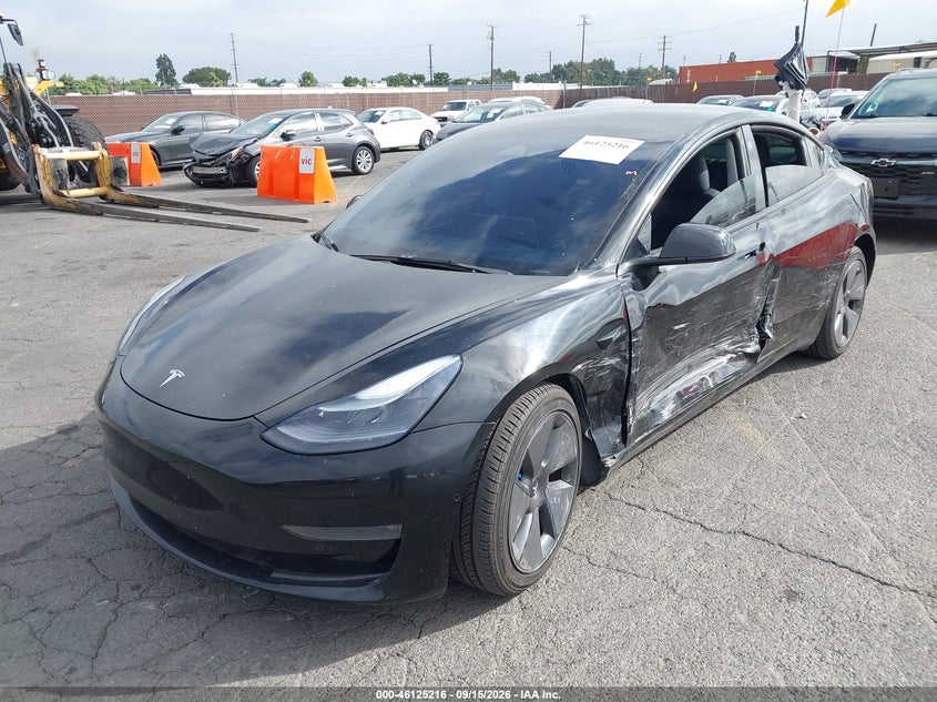 2022 Tesla Model 3 VIN 5YJ3E1EBXNF206613 IAAI salvage auction — SIDE, Salvage Title, sold $7,200 on 2026-10-25 (photo 2)