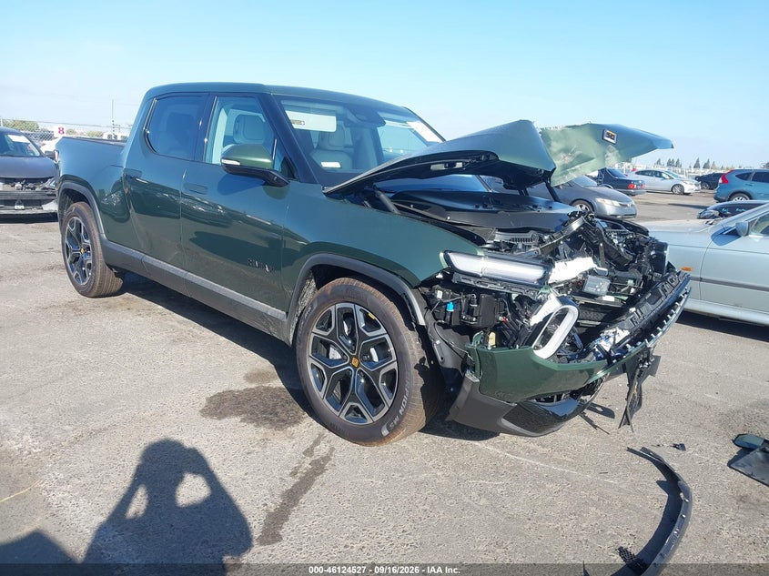 2026 Rivian R1t VIN 7FCTGFAA4TN047391 IAAI salvage auction — FRONT END, Salvage (California), sold $18,875 on 2026-10-21 (photo 1)