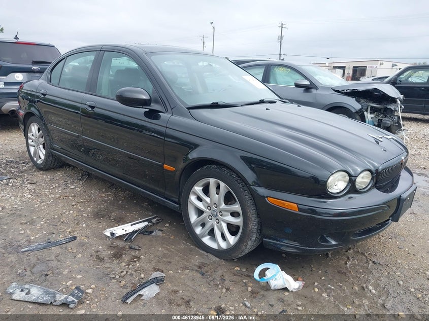 2002 Jaguar X type VIN SAJEA53DX2XC79549 IAAI salvage auction — NORMAL WEAR, Clear-Endorsement (Wisconsin), sold $275 on 2026-10-07 (photo 1)