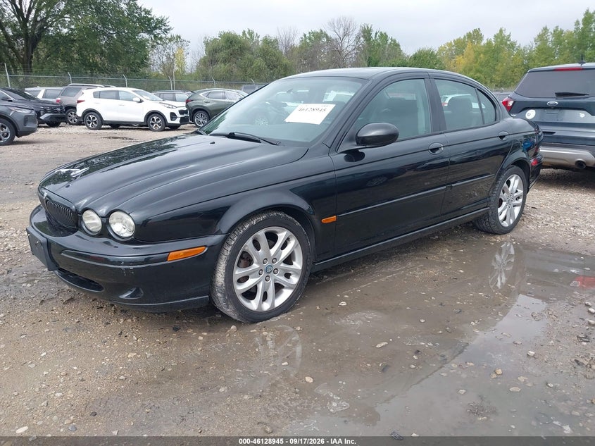 2002 Jaguar X type VIN SAJEA53DX2XC79549 IAAI salvage auction — NORMAL WEAR, Clear-Endorsement (Wisconsin), sold $275 on 2026-10-07 (photo 2)