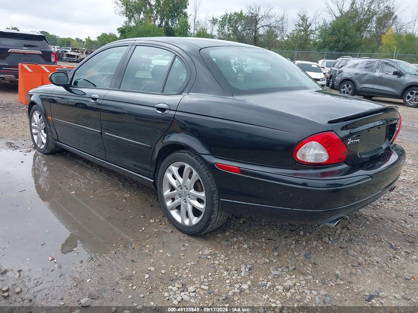 2002 Jaguar X type VIN SAJEA53DX2XC79549 IAAI salvage auction — NORMAL WEAR, Clear-Endorsement (Wisconsin), sold $275 on 2026-10-07 (photo 3)
