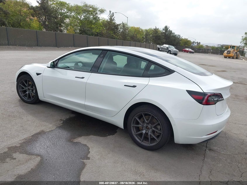 2021 Tesla Model 3 VIN 5YJ3E1EA5MF074947 IAAI salvage auction — SIDE, Wait Title, sold $3,550 on 2026-10-15 (photo 3)