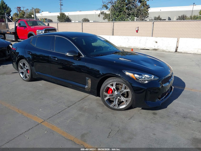 2021 Kia Stinger VIN KNAE35LCXM6092220 IAAI salvage auction — LEFT FRONT, Wait Title, sold $0 on 2026-10-11 (photo 1)