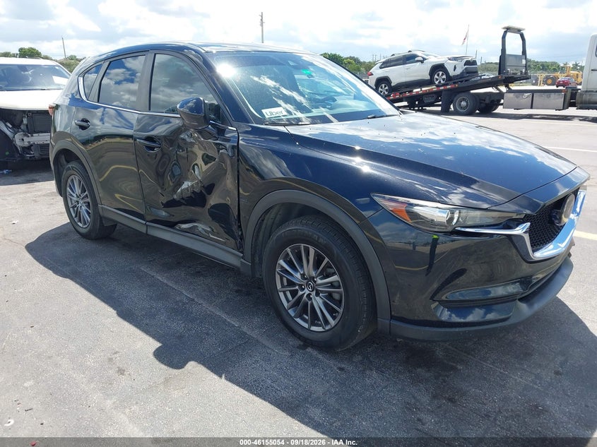 2019 Mazda Cx-5 VIN JM3KFACM9K1689195 IAAI salvage auction — SIDE, Wait Title, sold $5,600 on 2026-10-24 (photo 1)