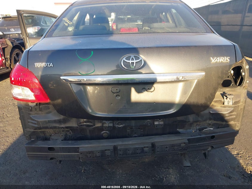 2009 Toyota Yaris VIN JTDBT903X94059092 IAAI salvage auction — REAR END, Salvage (California), sold $700 on 2026-10-08 (photo 6)