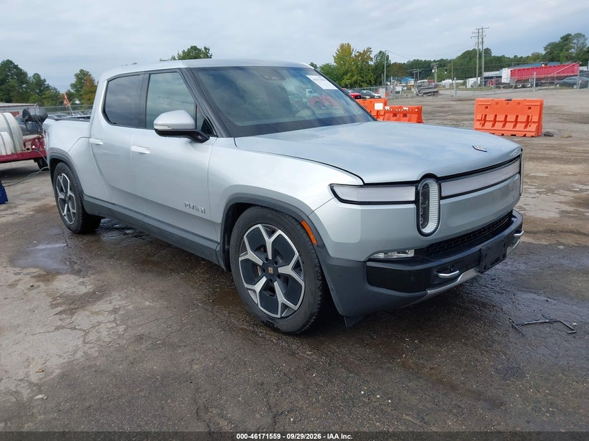 2023 Rivian R1t VIN 7FCTGBAA2PN026859 IAAI salvage auction — ROOF, Wait Title, sold $11,200 on 2026-10-24 (photo 1)