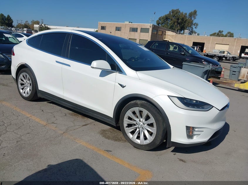 2017 Tesla Model x VIN 5YJXCBE20HF046095 IAAI salvage auction — REAR END, Salvage Title, sold $6,200 on 2026-10-15 (photo 1)