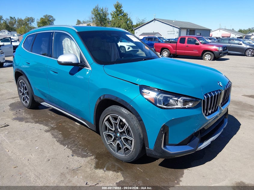 2023 BMW X1 VIN WBX73EF01P5X34348 — IAAI salvage auction photo