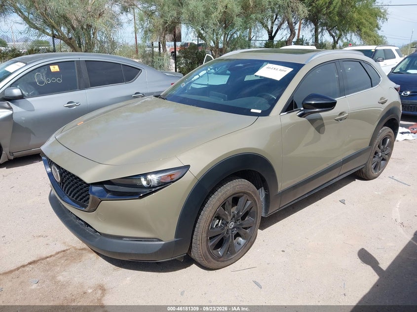 2024 Mazda Cx-30 VIN 3MVDMBXY2RM631404 IAAI salvage auction — SIDE, Salvage Title, sold $9,400 on 2026-10-15 (photo 2)