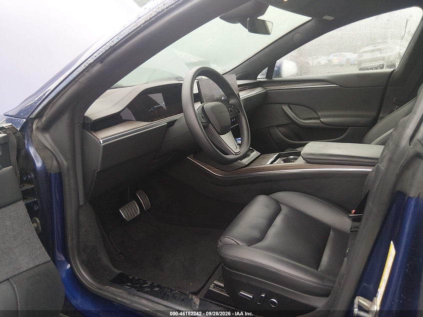 2023 Tesla Model s VIN 5YJSA1E51PF502947 IAAI salvage auction — WATER/FLOOD, Salvage (Idaho), sold $27,600 on 2026-10-22 (photo 5)