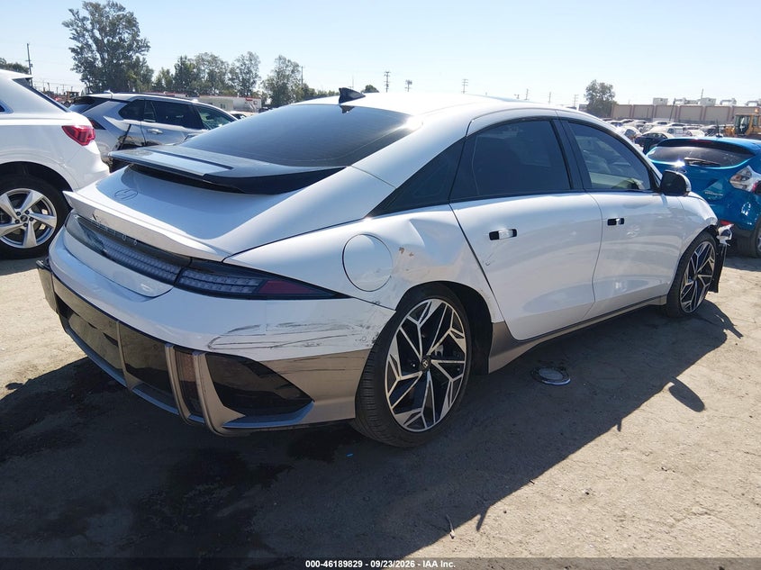 2024 Hyundai Ioniq 6 VIN KMHM54AAXRA074014 IAAI salvage auction — FRONT & REAR, Wait Title, sold $8,550 on 2026-10-15 (photo 4)