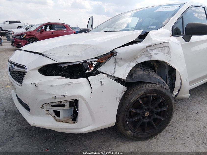 2019 Subaru Impreza VIN 4S3GTAB65K3702393 IAAI salvage auction — NORMAL WEAR, Salvage Title, sold $25 on 2026-10-04 (photo 6)