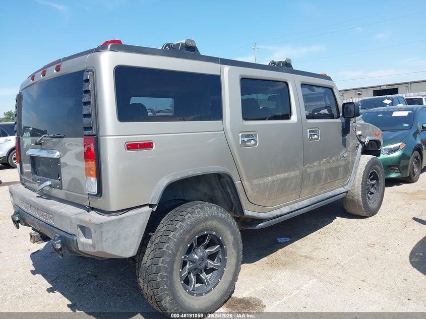 2004 Hummer H2 VIN 5GRGN23U34H102702 IAAI salvage auction — WATER/FLOOD, Salvage (Texas), sold $775 on 2026-10-07 (photo 4)