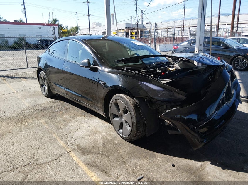 2023 Tesla Model 3 VIN 5YJ3E1EA8PF428867 — IAAI salvage auction photo