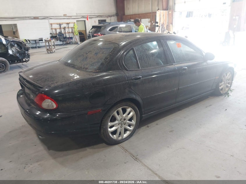 2003 Jaguar X type VIN SAJEA53C73WC90779 IAAI salvage auction — NORMAL WEAR, Clear (New York), sold $0 on 2026-10-25 (photo 4)
