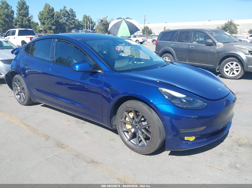 2022 Tesla Model 3 VIN 5YJ3E1EA4NF164611 IAAI salvage auction — REAR END, Salvage Title, sold $5,400 on 2026-10-16 (photo 1)