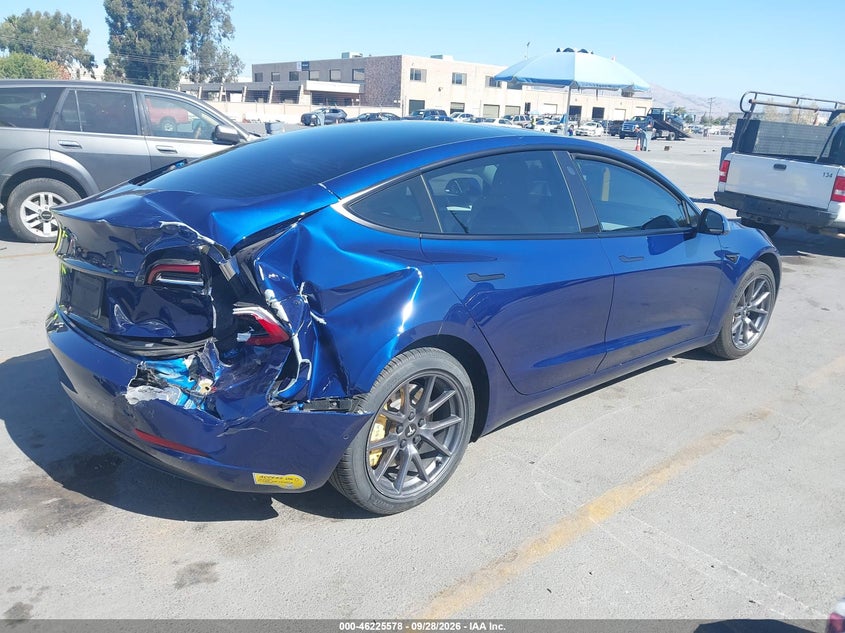 2022 Tesla Model 3 VIN 5YJ3E1EA4NF164611 IAAI salvage auction — REAR END, Salvage Title, sold $5,400 on 2026-10-16 (photo 4)