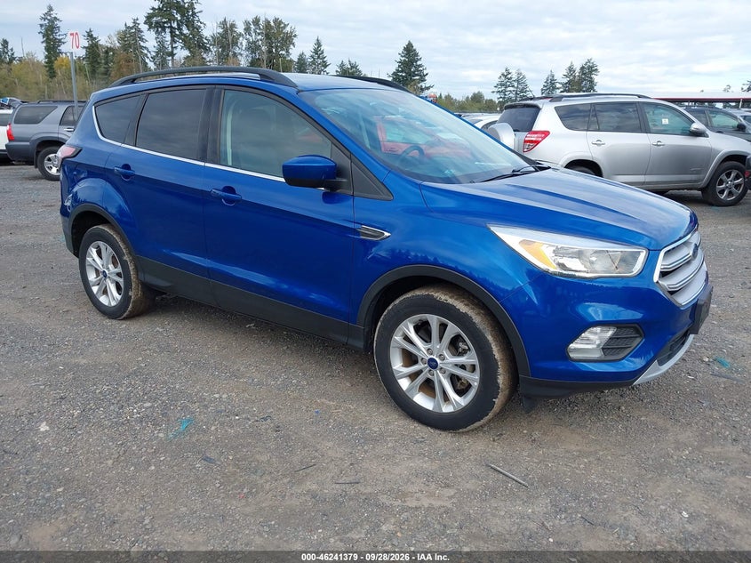 2018 Ford Escape VIN 1FMCU9GD1JUD31156 — IAAI salvage auction photo
