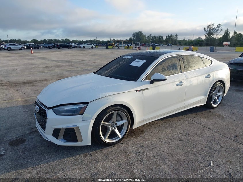 2021 Audi A5 VIN WAUDACF55MA059366 IAAI salvage auction — SIDE, Clear (Illinois), sold $5,250 on 2026-10-22 (photo 2)