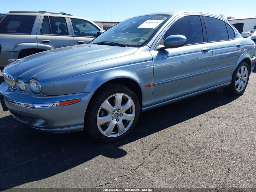 2005 Jaguar X type VIN SAJWA51A65WE56976 IAAI salvage auction — NORMAL WEAR, Clear (Nevada), sold $350 on 2026-10-16 (photo 2)