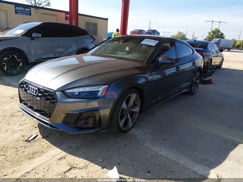 2021 Audi A5 VIN WAUFACF59MA042594 IAAI salvage auction — REAR END, Salvage Title, sold $13,600 on 2026-08-13 (photo 2)