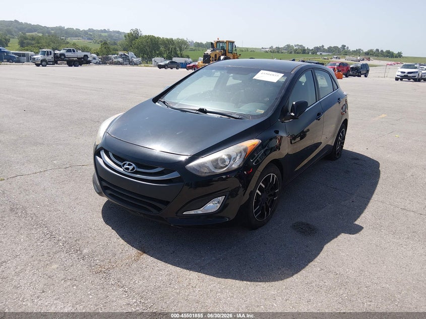 2013 Hyundai Elantra VIN KMHD35LE0DU089110 IAAI salvage auction — SIDE, Salvage (Missouri), sold $800 on 2026-07-10 (photo 2)