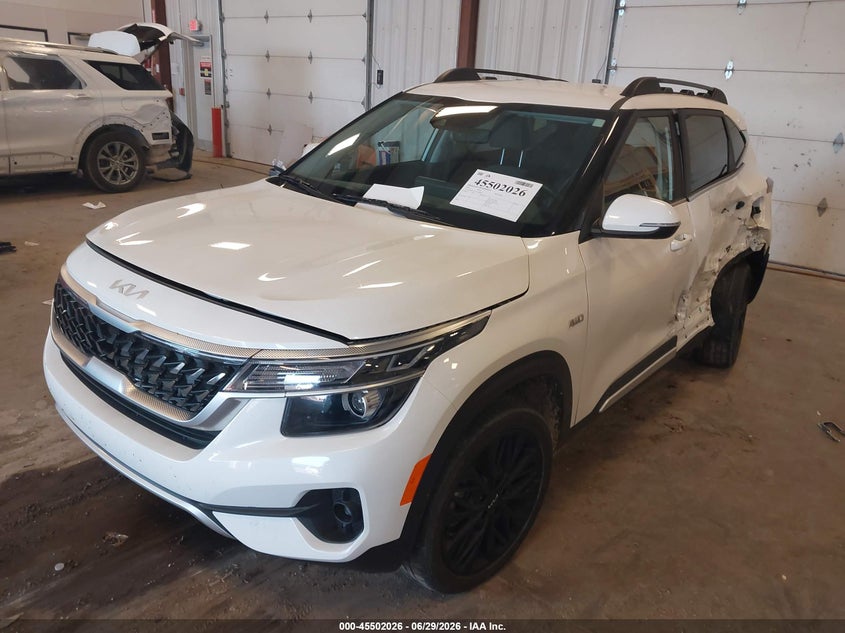 2022 Kia Seltos VIN KNDEUCA21N7304562 IAAI salvage auction — SIDE, Scrap (Michigan), sold $2,050 on 2026-07-28 (photo 2)
