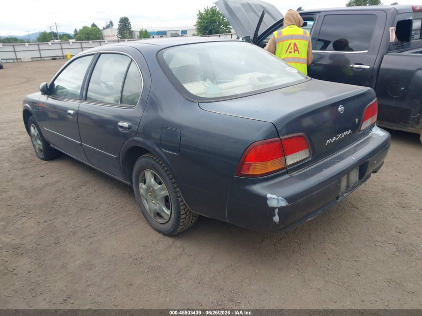 1998 Nissan Maxima VIN JN1CA21D5WT608971 IAAI salvage auction — NORMAL WEAR, Clear (Washington), sold $250 on 2026-07-14 (photo 3)