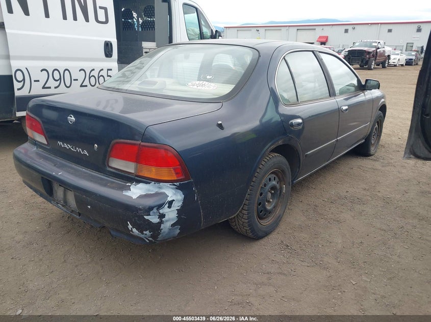 1998 Nissan Maxima VIN JN1CA21D5WT608971 IAAI salvage auction — NORMAL WEAR, Clear (Washington), sold $250 on 2026-07-14 (photo 4)