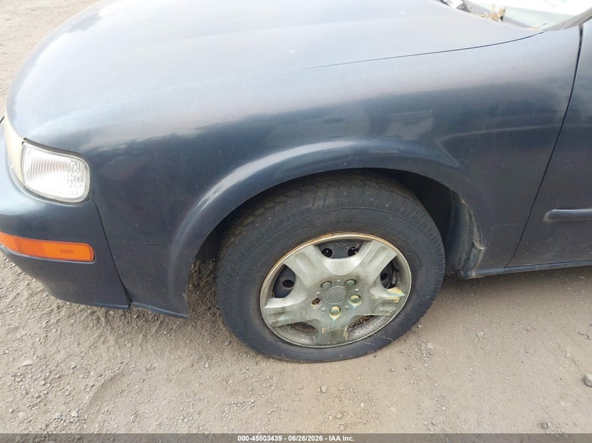 1998 Nissan Maxima VIN JN1CA21D5WT608971 IAAI salvage auction — NORMAL WEAR, Clear (Washington), sold $250 on 2026-07-14 (photo 6)