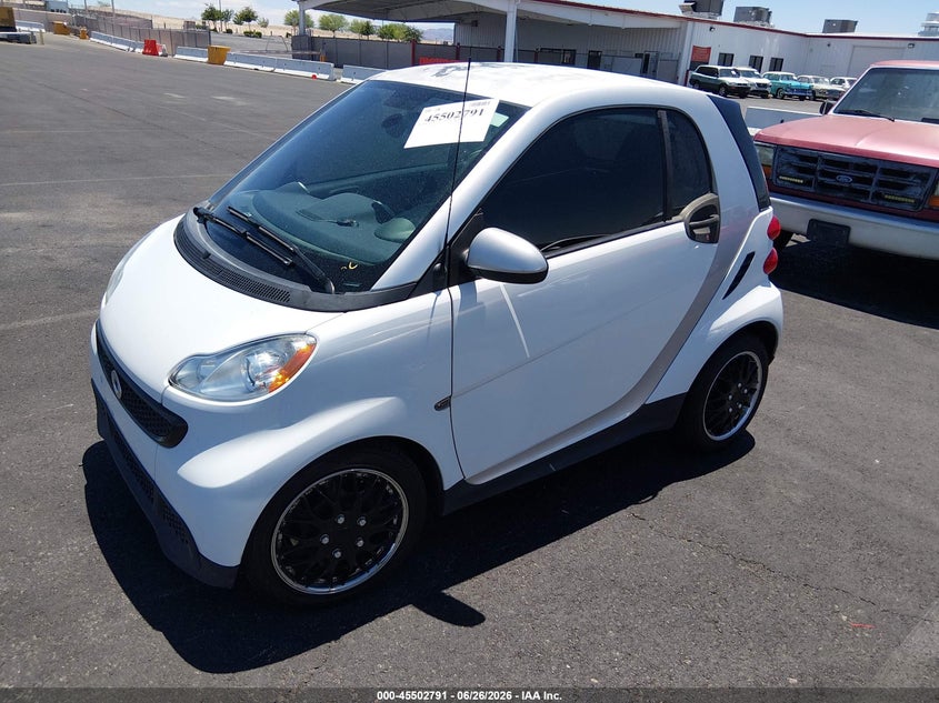 2013 Smart Fortwo VIN WMEEJ3BAXDK697375 IAAI salvage auction — NORMAL WEAR, Clear (Nevada), sold $500 on 2026-08-07 (photo 2)