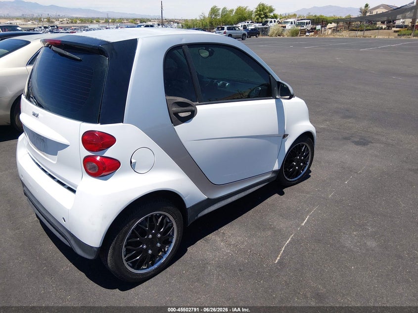 2013 Smart Fortwo VIN WMEEJ3BAXDK697375 IAAI salvage auction — NORMAL WEAR, Clear (Nevada), sold $500 on 2026-08-07 (photo 4)