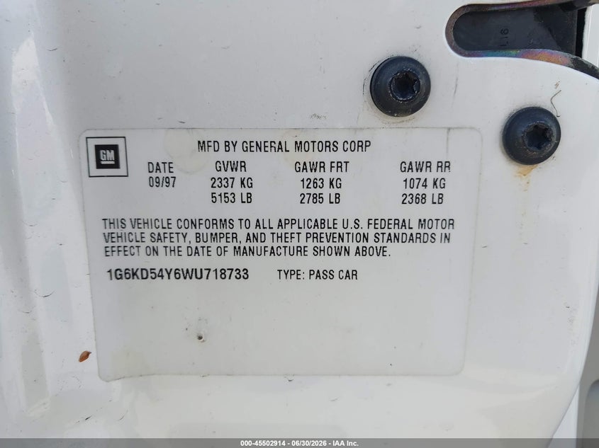 1998 Cadillac Deville VIN 1G6KD54Y6WU718733 IAAI salvage auction — REAR END, Clear - Dealer Only (California), sold $250 on 2026-07-08 (photo 9)